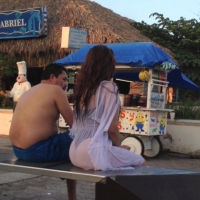 Girl in transparent dress with bikini underneath