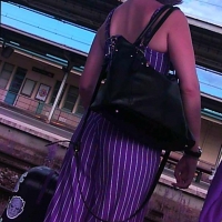 Candid lady in tight purple striped pants 68274981.jpg