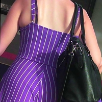 Candid lady in tight purple striped pants 68274987.jpg