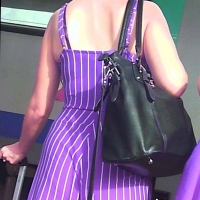 Candid lady in tight purple striped pants 68274986.jpg