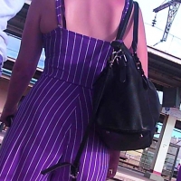 Candid lady in tight purple striped pants 68274984.jpg