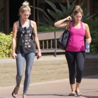 Skinny blonde in grey leggings with a friend Skinny blonde in grey leggings