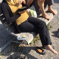 Candid feet and legs candidsexystreet_30877177177_Two women sunbathing their nylon feet.jpg