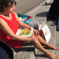 candidsexystreet_31100423857_Older woman sunbathing her nylon legs & feet.jpg