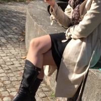 candidsexystreet_44324230380_Legs in sheer nylons and high black leather boots.jpg