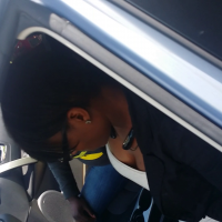 Ebony girls cleavage while sitting in the car Ebony cleavage