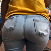 Hot brunette babe in tight jeans with a big booty and vpl Hot brunette with a big booty