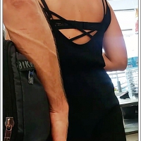 Supermarket girl in black romper