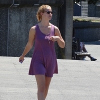 Candid girls with nice tits in public Girl appears to be squeezing her nipple (4).jpg