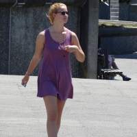 Candid girls with nice tits in public Girl appears to be squeezing her nipple (3).jpg