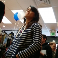Milf in jeans at comic book store