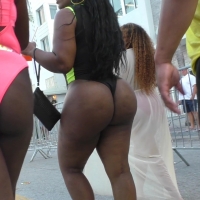 Candid sexy ebony party babe with a huge round bubble in a black thong swimsuit 77.mp4-2024-07-30-15h41m46s471.jpg