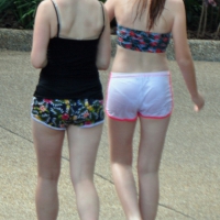 Couple girls in wet shorts