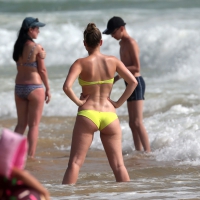 Big booty white girl in a yellow bikini at the beach Whooty in yellow
