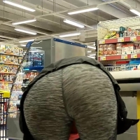 Grey leggings bend over
