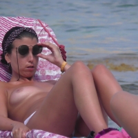 Topless brunette milf with sexy suckable titties boobs-and-sunbeds-27-102.jpg