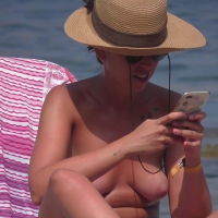 Topless brunette milf with sexy suckable titties boobs-and-sunbeds-27-112.jpg