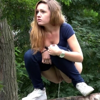 Hot girl pisses on a tree stump in the woods video-woodland_1080p.mp4-2023-08-05-06h49m15s432.jpg