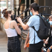 Zoey Deutch on the set of Not Okay in New York with a pokies shot 06.jpg