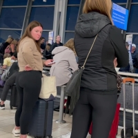 Two candid girls in leggings with nice asses standing in line at the airport IMG_4257.MOV-2023-08-16-17h42m13s701.jpg