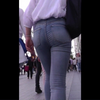 Brunette in tight jeans