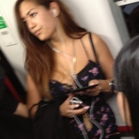 Candid Asian girl showing some cleavage on the train tumblr_o2y1tdaWcA1usr3jvo8_500.jpg