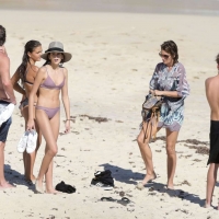 Kaia Gerber paparazzi pics in a purple bikini at the beach 16.jpg