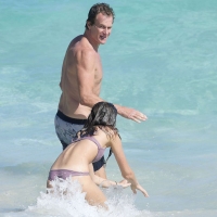 Kaia Gerber paparazzi pics in a purple bikini at the beach 14.jpg