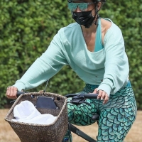Jennifer Lopez candid out for her daily bike ride in the Hamptons 09.jpg