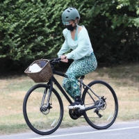 Jennifer Lopez candid out for her daily bike ride in the Hamptons 11.jpg