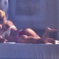 Shakira out on a boat in a thong bikini showing her great booty 2.jpg