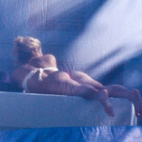 Shakira out on a boat in a thong bikini showing her great booty 8.jpg