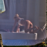 Shakira out on a boat in a thong bikini showing her great booty 12.jpg