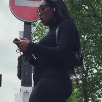 Candid sexy nerdy ebony babe with a bubble butt in a tight black dress OhDjaDja.mov-2024-08-18-08h53m32s798.jpg