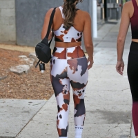 Vanessa Hudgens in cow-print crop top and leggings with GG Magree in Los Angeles 11.jpg