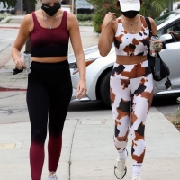Vanessa Hudgens in cow-print crop top and leggings with GG Magree in Los Angeles vanessa-hudgens-sports-cow-print-crop-top-and-leggings-as-she-hits-the-gym-with-bff-gg-magree-in-los-angeles-180821_2.jpg