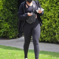 Lori Harvey candid looking sexy in leggings and a sports bra after pilates 16.jpg