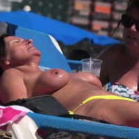 Multiple candid topless babes at the beach showing their boobs boobs-and-sunbeds-32_4k.mp4-2021-08-19-12h35m56s823.jpg