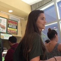 Beautiful college babe showing some cheeks