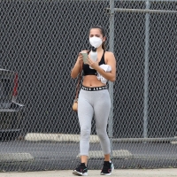 Isabela Merced leaving the gym in LA in grey leggings 06.jpg