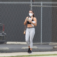Isabela Merced leaving the gym in LA in grey leggings 01.jpg