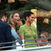 Kendall Jenner candid in a green dress and braless kendall-jenner-looks-stunning-in-a-green-dress-at-her-drink-818-launch-party-in-the-hamptons-new- (5).jpg