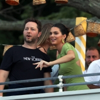 Kendall Jenner candid in a green dress and braless kendall-jenner-looks-stunning-in-a-green-dress-at-her-drink-818-launch-party-in-the-hamptons-new- (2).jpg