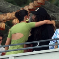 Kendall Jenner candid in a green dress and braless kendall-jenner-looks-stunning-in-a-green-dress-at-her-drink-818-launch-party-in-the-hamptons-new- (7).jpg