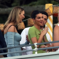 Kendall Jenner candid in a green dress and braless kendall-jenner-looks-stunning-in-a-green-dress-at-her-drink-818-launch-party-in-the-hamptons-new (10).jpg