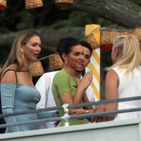 Kendall Jenner candid in a green dress and braless kendall-jenner-looks-stunning-in-a-green-dress-at-her-drink-818-launch-party-in-the-hamptons-new- (9).jpg