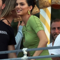 Kendall Jenner candid in a green dress and braless kendall-jenner-looks-stunning-in-a-green-dress-at-her-drink-818-launch-party-in-the-hamptons-new-york.jpg