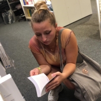 Candid sexy bookstore babe in denim shorts and a transparent top showing her bra transparent top.MOV-2023-08-25-16h23m17s106.jpg