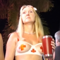 Candid sexy mature milf in a nurse costume showing her ass cheeks 69.mp4-2024-08-25-10h16m16s431.jpg