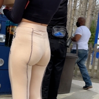 Sexy Latina in flared leggings